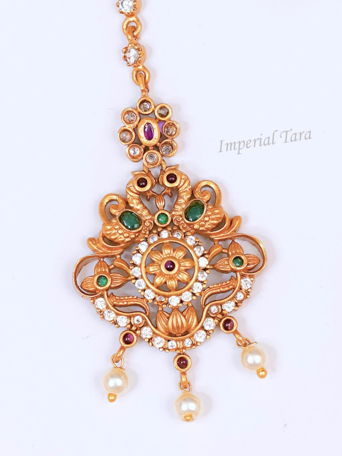 Trendy Wedding Peacock Maang Tikka | Bridal Maang Tikka Online | Peacock Pearl Maang Tikka | Hair Accessories | Gold Maang Tikka Online | Temple Jewellery Maang Tikka .