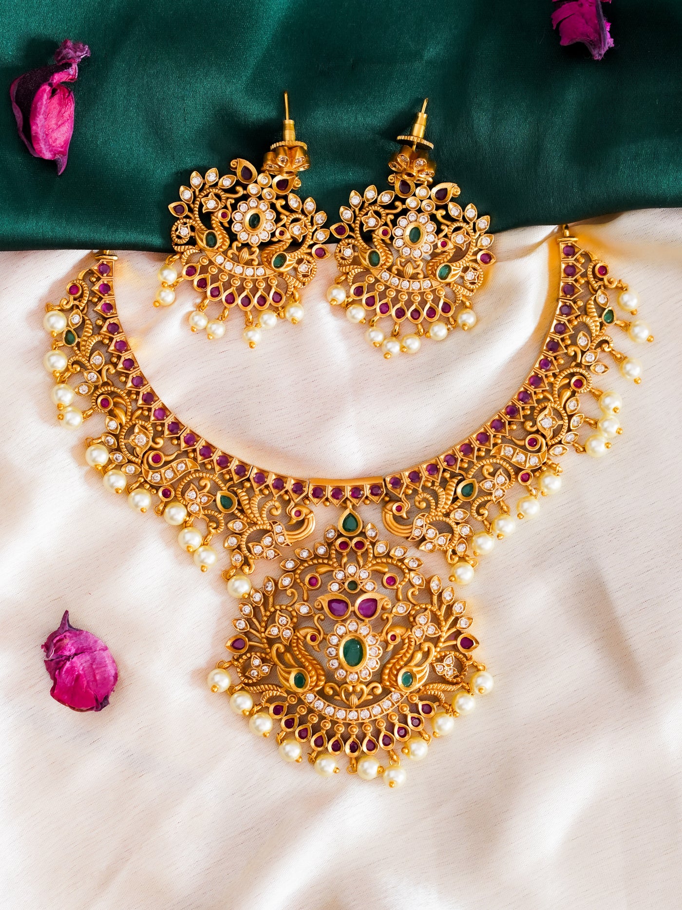 finely detailed peacock pearl necklace set